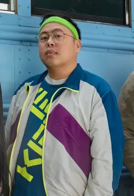 Nico Santos plays Hugh in 