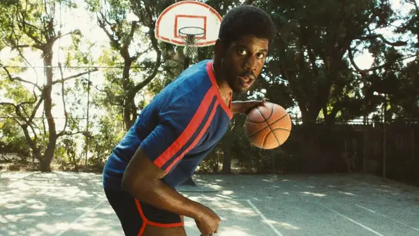 Quincy Isaiah as Earvin 