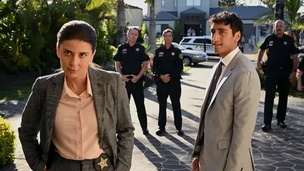 From left to right Detective Elena Camacho (Jeanine Serralles) and her assistant (Dylan Thuraisingham) in 