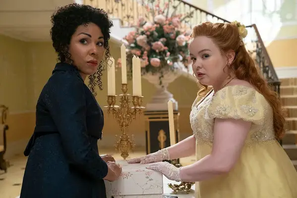 Kathryn Drysdale as Genevieve, Nicola Coughlan as Penelope Featherington in episode 206 of 