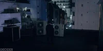 TOKYO VICE 207 SATO ON THE ROOFTOP LIT IN PURPPLE