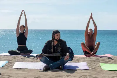 CHRISTMAS IN PARADISE, Billy Ray Cyrus (center), 2022. © Lionsgate Home Entertainment /Courtesy Everett Collection