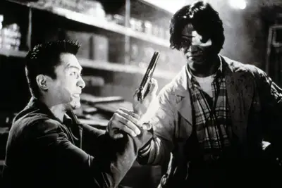 HARD BOILED, Chow Yun Fat (l.), 1992, (c)Rim/courtesy Everett Collection
