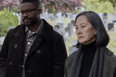 Saul Durand (Jovan Adepo) and Ye Wenjie (Rosalind Chao) in 