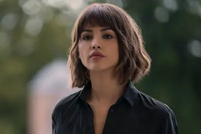 Eiza González as Auggie Salazar in 