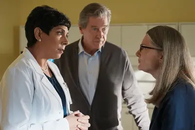 Tosca Baggoo as Dr Freeman, Tim Matheson as Doc Mullins, Annette O