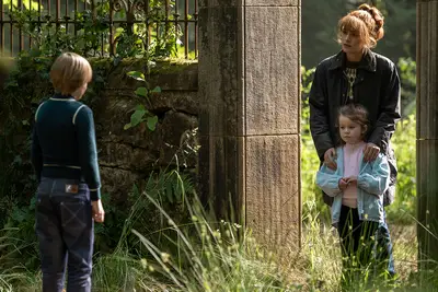 Brianna and kids in cemetery in 