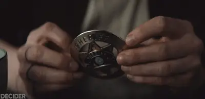 silo ep 4 FLIPPING OVER THE BADGE TO REVEAL TRUTH