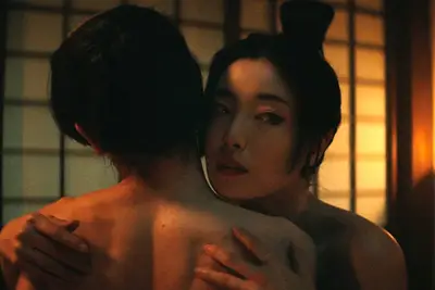 Kiku (Yuka Kouri) sleeping with the boy in 