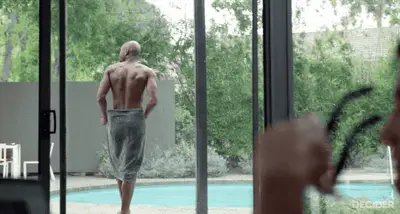 Ed takes off towel and reveals butt in Velvet Buzzsaw