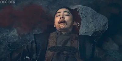 SHOGUN Ep7 Nagakado, freshly dead, lying on the garden rocks as his blood pools in the ikeniwa)