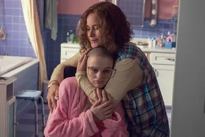 Patricia Arquette hugging Joey King on The Act