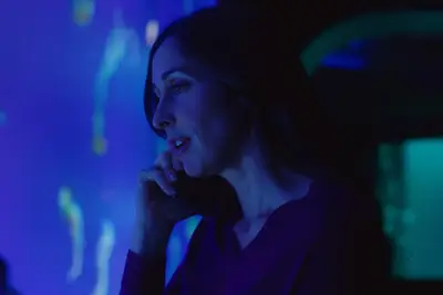 Kate (Catherine Reiman) on the phone in Workin