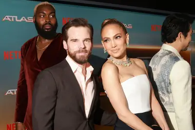 LOS ANGELES, CALIFORNIA - MAY 20: (L-R) Gregory James Cohan and Jennifer Lopez attend the premiere of Netflix