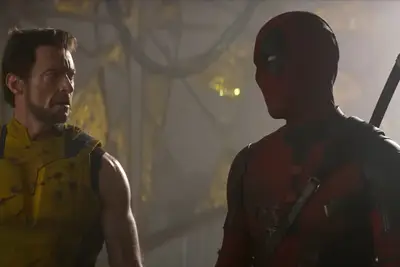 Deadpool and Wolverine staring at each other