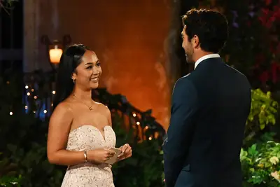 Joey Graziadei talking to Lea outside the mansion on 