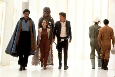 Lando giving a tour of Cloud City to Chewbacca, Leia, and Han in 