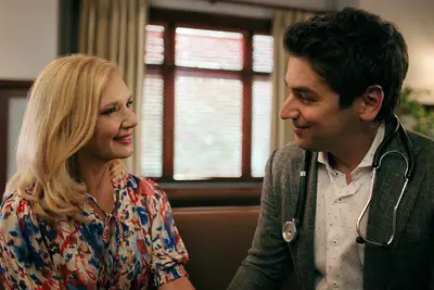 Teryl Rothery as Muriel St. Claire, Mark Ghanime as Dr. Cameron Hayek in 