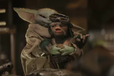 The Mandalorian - Grogu hugging a Babu Frik